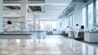 © Ameliaa - Bright, modern laboratory with scientists working at benches, glass equipment, and large windows