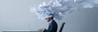 © olga_demina - Office worker overwhelmed by information overload, with papers exploding from his head while working at a laptop, illustrating stress and burnout in the modern workplace