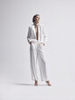 © Cumhur - Elegant Bridal Alternative: White Sequin Pantsuit Portrait