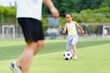 © Bo Bo/Stocksy - Little Girl Practicing Soccer Skills on Grass Field in Sunny Day