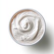 © morepiixel - A top view of a white bowl filled with smooth, creamy yogurt or sour cream on a white background.