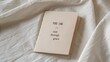 © Arif - Minimalist design of a greeting card with the phrase 'rest through grace' on a subtle linen background, showcasing a calming aesthetic for wellness themes