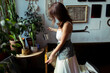 © Olga Murzaeva/Stocksy - A woman spends time in her furniture restoration studio