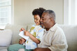© Guille Faingold/Stocksy - Grandfather and Grandson Bond at Home