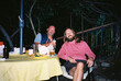 © Boris Jovanovic/Stocksy - Friends enjoy their time at night in a relaxed setting.