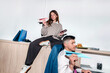 © Lucas Ottone/Stocksy - Coworkers Making Paper Airplanes At Work