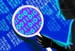 © Iryna Auhustsinovich/Stocksy - Hacker Inspecting Digital Footprint – Cybersecurity Threat Concept