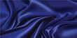 © FSompa - Abstract vector background luxury blue cloth or liquid wave or wavy folds of grunge silk texture satin velvet material, luxurious background or elegant wallpaper