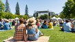 © AZ Studio - People enjoying an outdoor concert on a sunny day, sitting on blankets on the grass