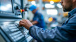 © Laura - Faceless male engineer or apprentice using CNC machine in factory, machine operation, manufacturing work, technical skill, industrial activity, with copy space