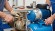 © Janna - Plumber repairing water pump in industrial workshop
