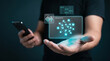 © ParinApril - Man Holds Smartphone and Displays Holographic Neural Network to Stream Data, Generate Content, and Visualize Connections, Focusing on Mobile Processing and Network Architecture in a Dark Environment