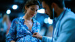 © Aliaksandra - Doctor uses a stethoscope to examine a pregnant woman belly during a prenatal consultation in a modern clinic