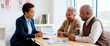 © Xenia - Doctor explaining a diabetes management and nutrition plan to a senior couple. Healthcare professional consulting with older African American patients in a medical office