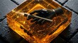 © Fadhlan - Close-up of hand holding torch in amber ashtray on stone surface