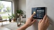 © Prime - Person using smart home control panel touchscreen to manage lighting climate security and energy consumption, modern IoT automation system, connected house technology