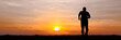 ©  2026stockx - A lone runner silhouetted against a vibrant sunset, embodying dedication and the pursuit of health. The warm hues of the sky create a dramatic backdrop for this moment of personal triumph