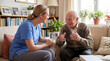 © Emre Akkoyun - Caregiver providing home care, talking with a happy senior man enjoying conversation and companionship