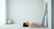 © Dmitrii - Woman performing legs up the wall pose for nervous system reset. Practicing restorative yoga against wall for body relaxation and stress relief. Mindfulness technique for mental health.