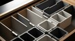 ©  DreamGenix - Empty kitchen drawer organizer with adjustable dividers for cutlery and utensils. customizable drawer organizers