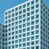 Blue and border white geometric pattern on modern building facade