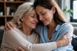 © Carlos - Two women embrace warmly, one younger, one older