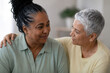© Carlos - Two women share a warm, tender moment