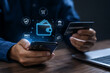 © Renuka - person using smartphone with holographic wallet icons hologram money finance