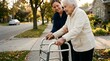 © tech_with_mayur - Young female caregiver helping happy elderly senior woman walk with walker outdoors in suburban neighborhood during autumn showing elderly care support assistance and compassionate nursing for old age