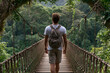 © NTGUILTY - Person walks on a rope bridge in a forest on a sunny day