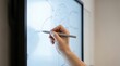 © velikiyzayats - Male hand using digital stylus on interactive whiteboard drawing brain diagram for neuroscience education concept