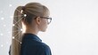 © Visionary - Profile portrait of young blonde woman wearing glasses looking away, overlaid with abstract white geometric network connection lines and dots, representing artificial