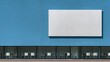 © Ryzhkov - Large blank white billboard mounted on a textured blue exterior wall of a modern building for outdoor advertising, corporate branding and architectural mockup