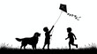© Ashish - Silhouette of two boys playing with a kite and a dog in the field