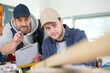 © auremar - two wood designer working in workshop