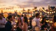 © Arham - Blurred rooftop party sunset bokeh city skyline background social gathering celebration nightlife evening drinks people outdoor event atmosphere