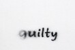 © Fotograf - A close-up shot of a handwritten quote on a white towel with black ink