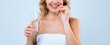© Prostock-studio - Smiling Young Woman Holding Glass Of Water While Taking Dietary Supplement At Home. Happy Adult Female Engaging In Healthy Lifestyle Routine. Hygiene And Self-care In Health Context