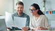 © Prostock-studio - Smiling Caucasian Man And Woman Analyzing Documents And Discussing Ideas In A Bright Modern Office, Collaborating And Sharing Insights As Part Of Their Professional Work Environment. Business Concept