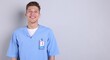 © New Africa - Portrait of medical assistant on light grey background. Space for text