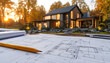 © DEXTEROUA - House blueprint with pencil on paper near modern home in autumn forest. Architect plans new building. Design construction process. Real estate development.