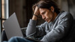 © Createya - Young caucasian male adult working from home on laptop looking frustrated concept of freelancing, remote work for tech companies and online education platforms