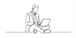 © Ratna Art_Gallery - Man in suit sitting and working on laptop