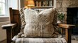 © Chennai - Decorative embroidered pillow on a rustic wooden chair