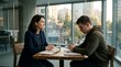 © Rimsha - Professional mentor and young student sit together at a wooden table in a sunlit office to discuss academic goals and future career development during a private consultation session.