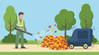 © Shearpedge Design - Professional gardener using a leaf blower to clear autumn leaves
