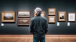 © VeretiLab - Man with gray hair contemplates art in a museum gallery with framed paintings