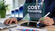 © Wei - Businessman analyzing cost focusing strategy with rising bar chart graph on digital tablet, financial management, budget control, expense reduction, profit growth, corporate