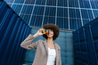 © VISTA by Westend61 - Cheerful photographer taking photo outdoors near solar panel