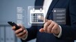 © sami - Businessman interacting with a digital calendar interface, managing tasks and scheduling appointments with a smartphone in a professional office setting